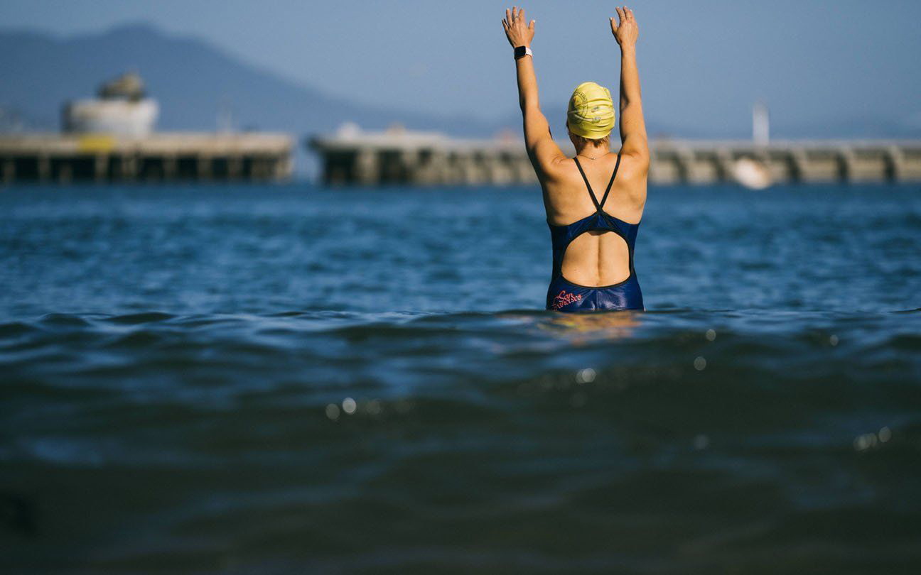 Photo of person swimming in the San Francisco Bay.