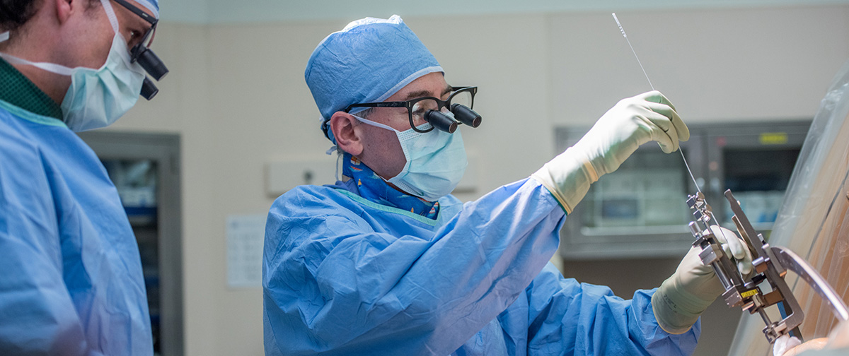 Phillip Starr, MD, PhD, implants a deep brain stimulation device to treat a patient with Parkinson's disease