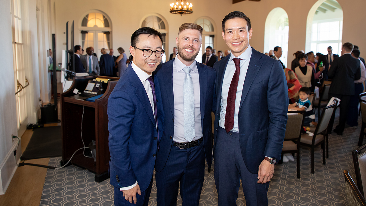 UCSF graduating chief residents Alex Lu, MD, Jacob Young, MD, and Winward Choy, MD, stand together for a photo.